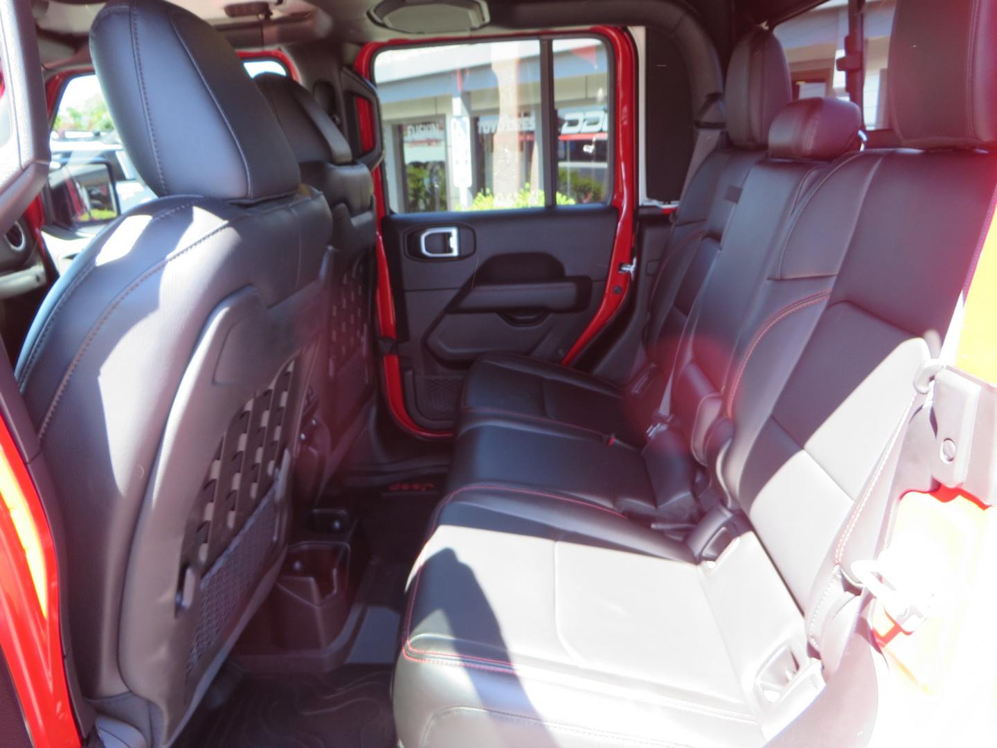 2020 Red /black Jeep Gladiator Rubicon (1C6JJTBG6LL) with an 3.6L V6 DOHC 24V engine, 6M transmission, located at 2630 Grass Valley Highway, Auburn, CA, 95603, (530) 508-5100, 38.937893, -121.095482 - Rubicon Gladiator featuring a Mopar suspension system with Fox shocks, 17" AEV wheels wrapped in 37" BFG tires, Warn Winch, Rock sliders, Cascade front license plate holder, Impact bedliner, Built Right Industries bed Molle panels, and Window tint. - Photo#41